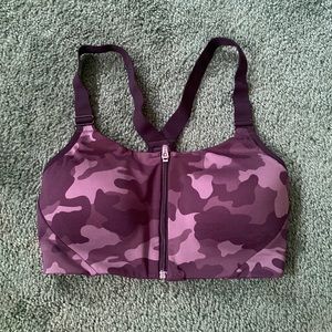 Black camo All In Motion zip up sports bra. Size 34C.